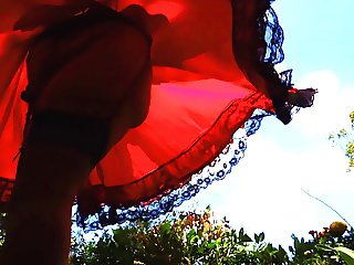 Sissy Ray in Red Satin dress swirling upskirt