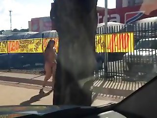 Crazy lady walking naked in public